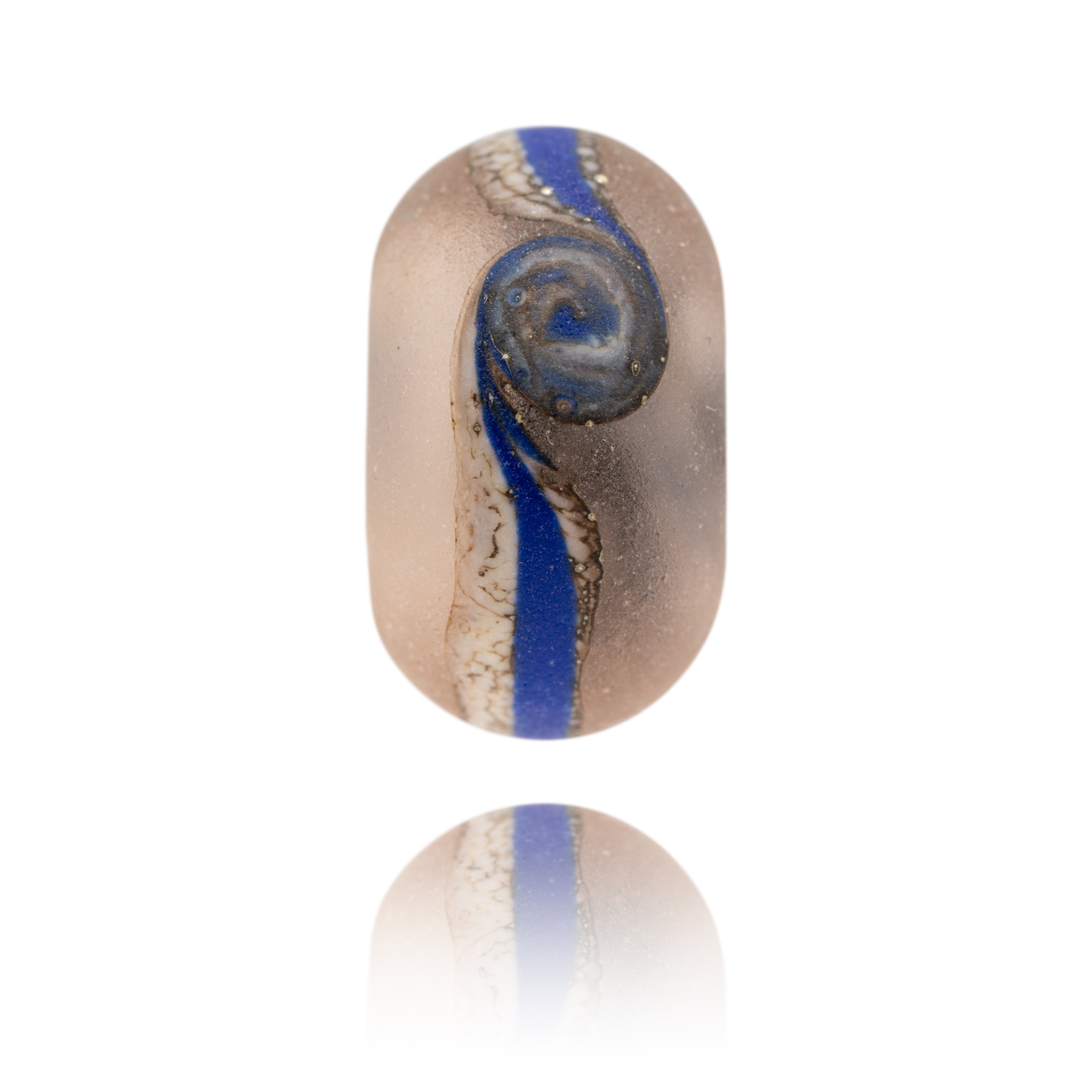 Frosted pink glass bead decorated with blue stripe around middle. Representing Embleton Beach in Northumberland.