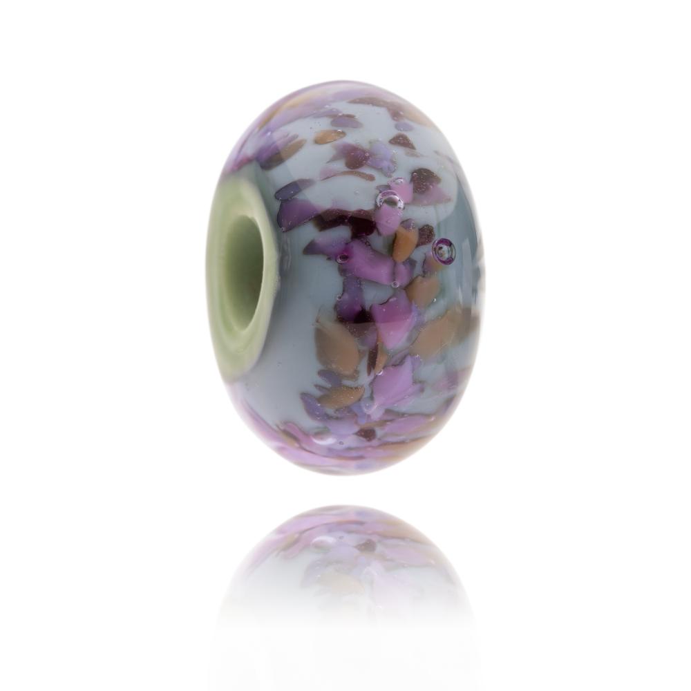 Purple, green and brown glass bead designed to represent Exmoor National Park in the UK.