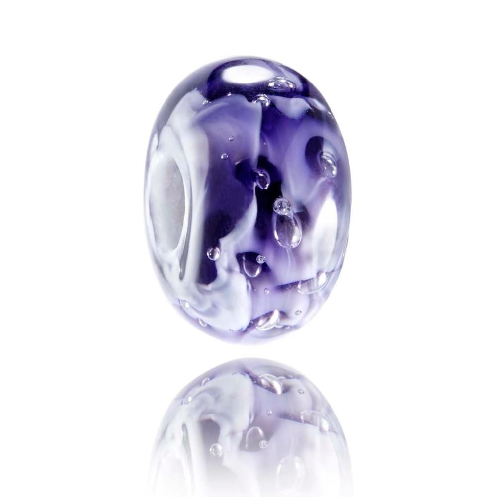 Purple swirling glass bead with bubbles inside the glass, representing Hayle in Cornwall.