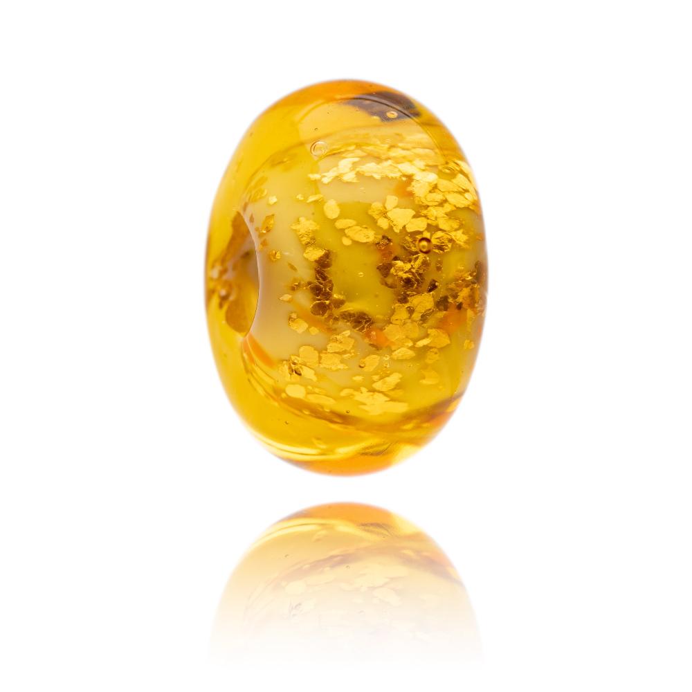 Gold glitter glass bead representing Islay in Scotland.