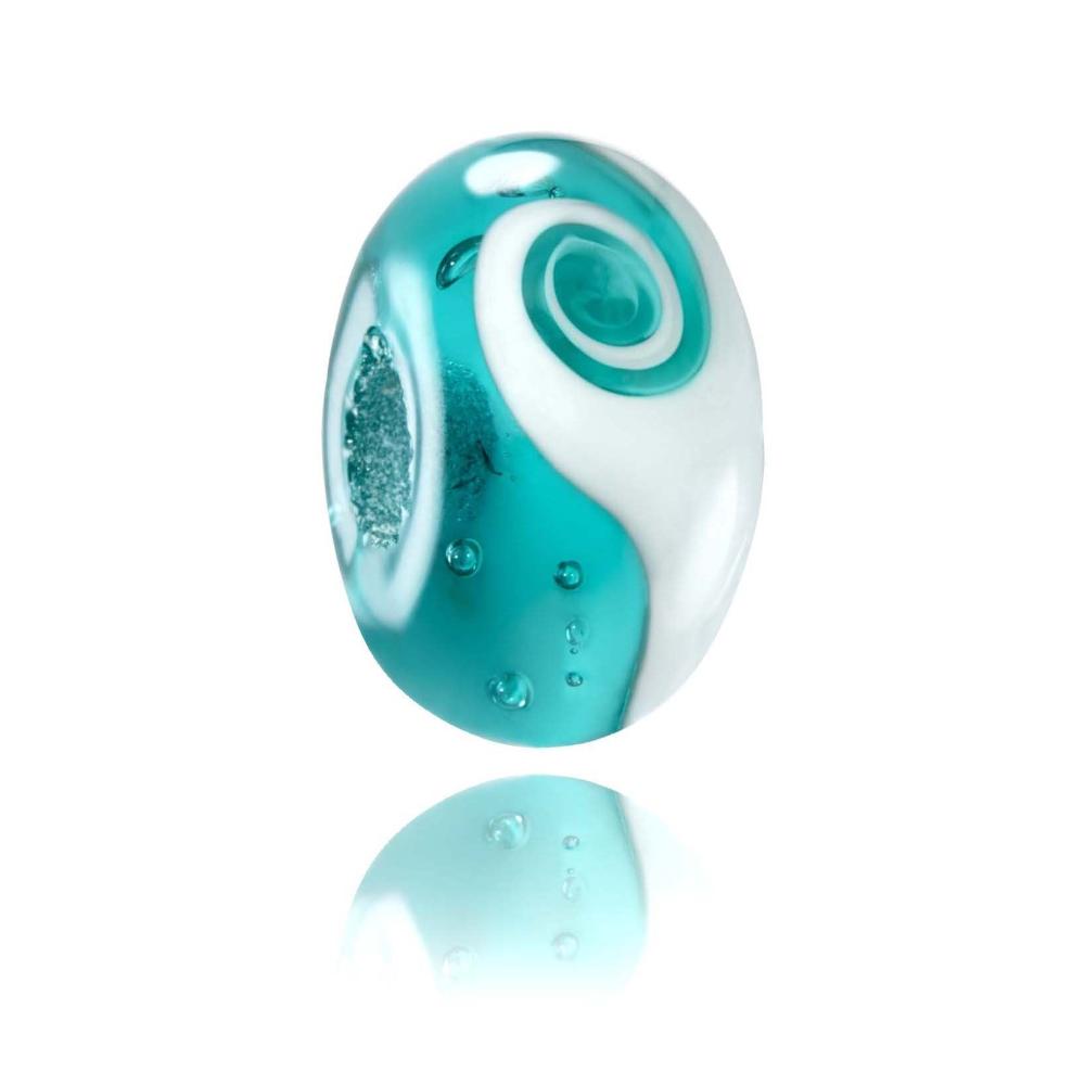 Teal and green glass bead with a swirl in the middle and small bubbles in the glass, designed for Kynance Cove in Cornwall.