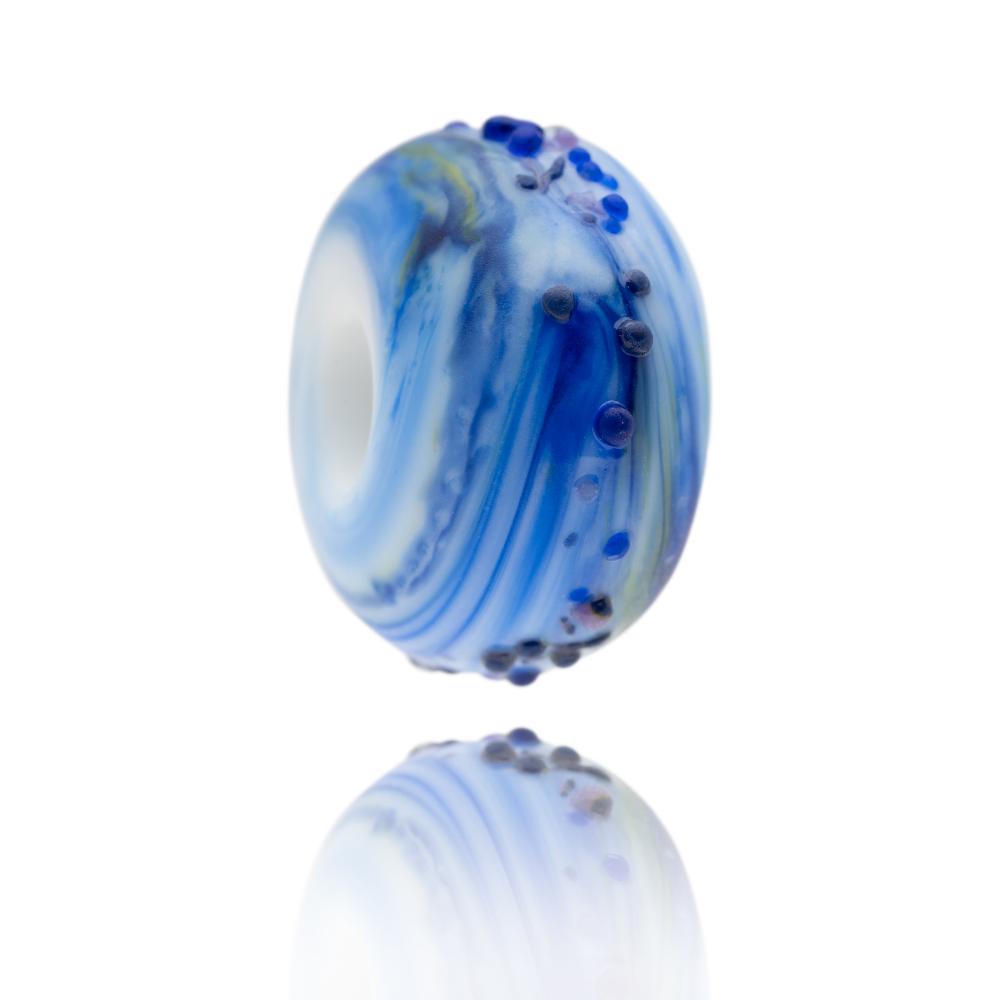 Blue swirling glass beads with surface texture for Lecht in Scotland.