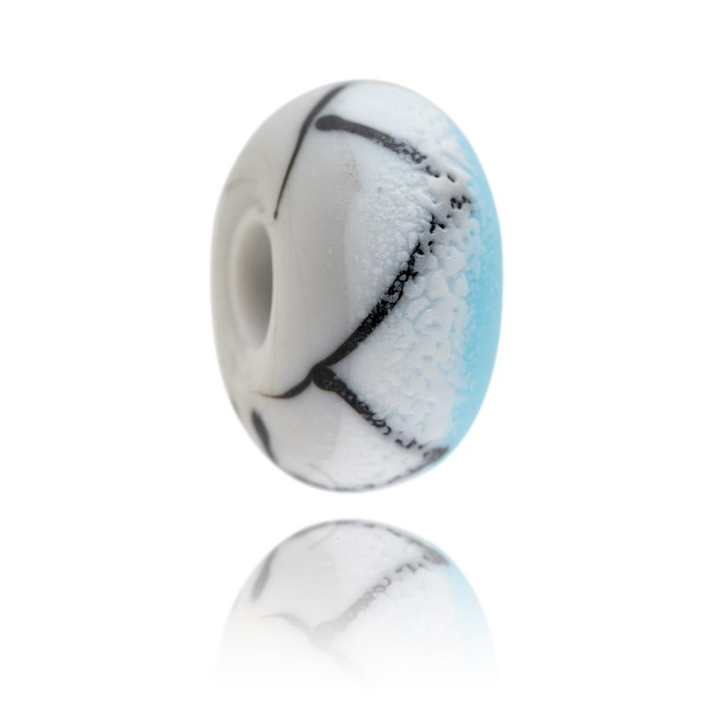 Grey and light blue glass bead with frosted 'snow' texture on the surface e with criss cross black mountain peak. Designed for Les Deux Alpes in France.