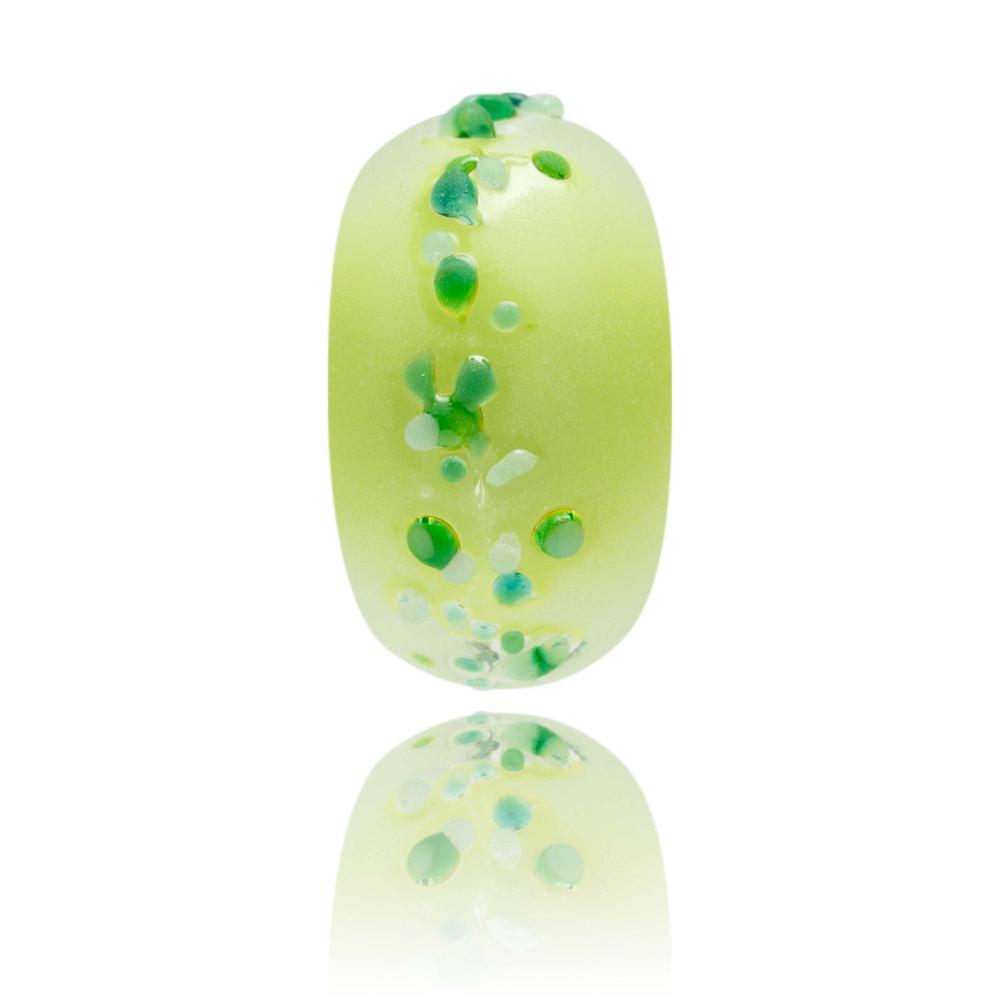 Green frosted glass bead with lumps of green glass surface texture. Designed for Llangrannog Beach In Wales.