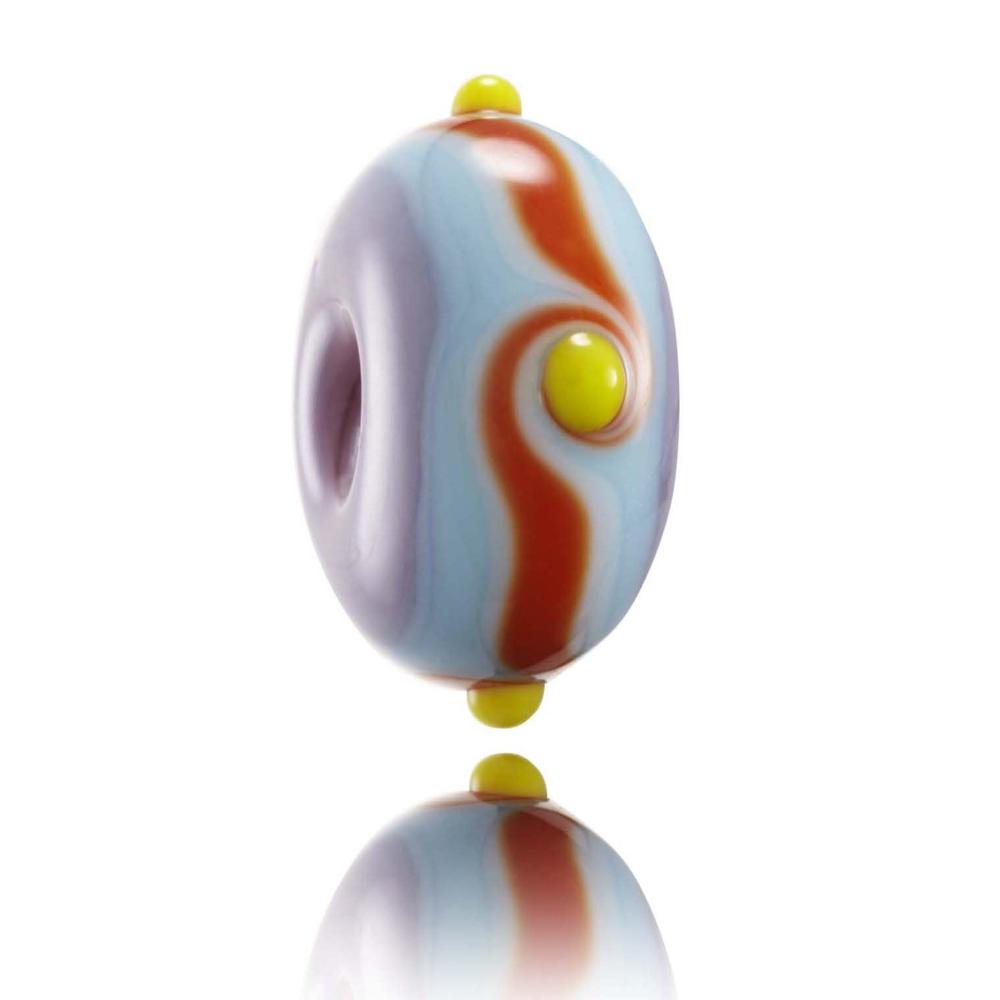 Purple, blue and orange striped glass bead with yellow dots on surface, representing Molokai Island in Hawaii.