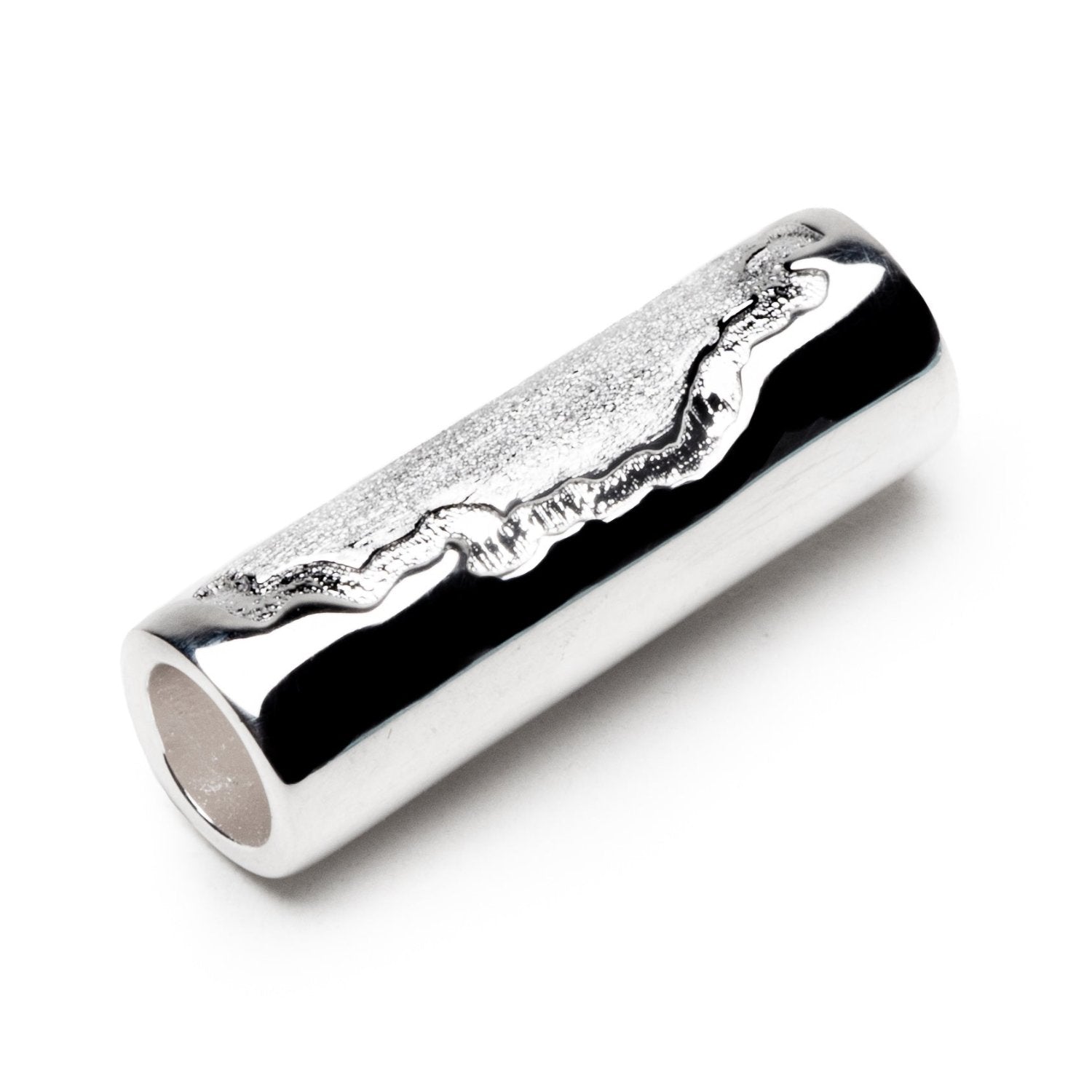 Silver tube shaped bead with Norfolk county engraved on the surface.