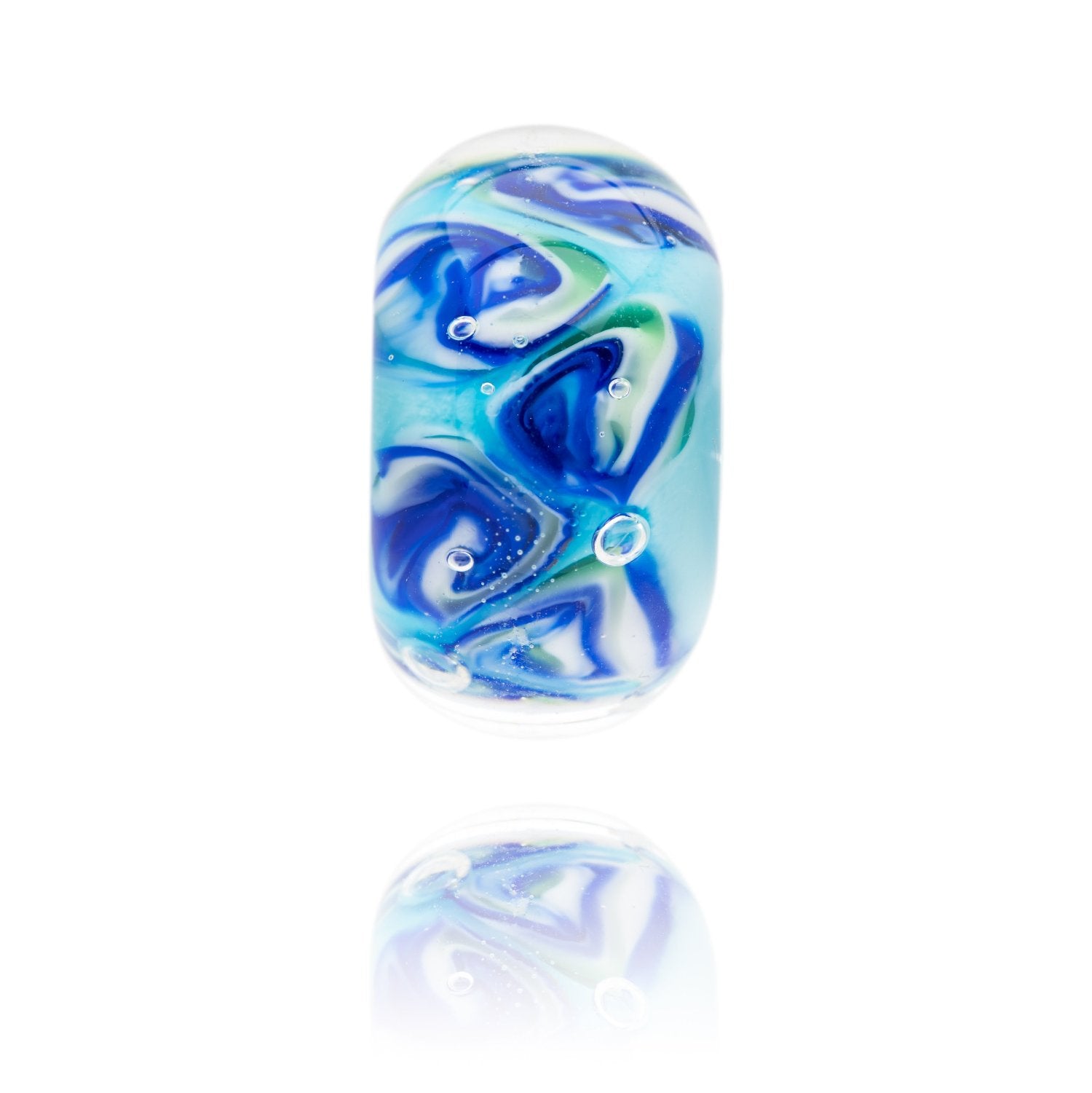 Blue, white and green swirling glass bead representing Perranporth beach in Cornwall.