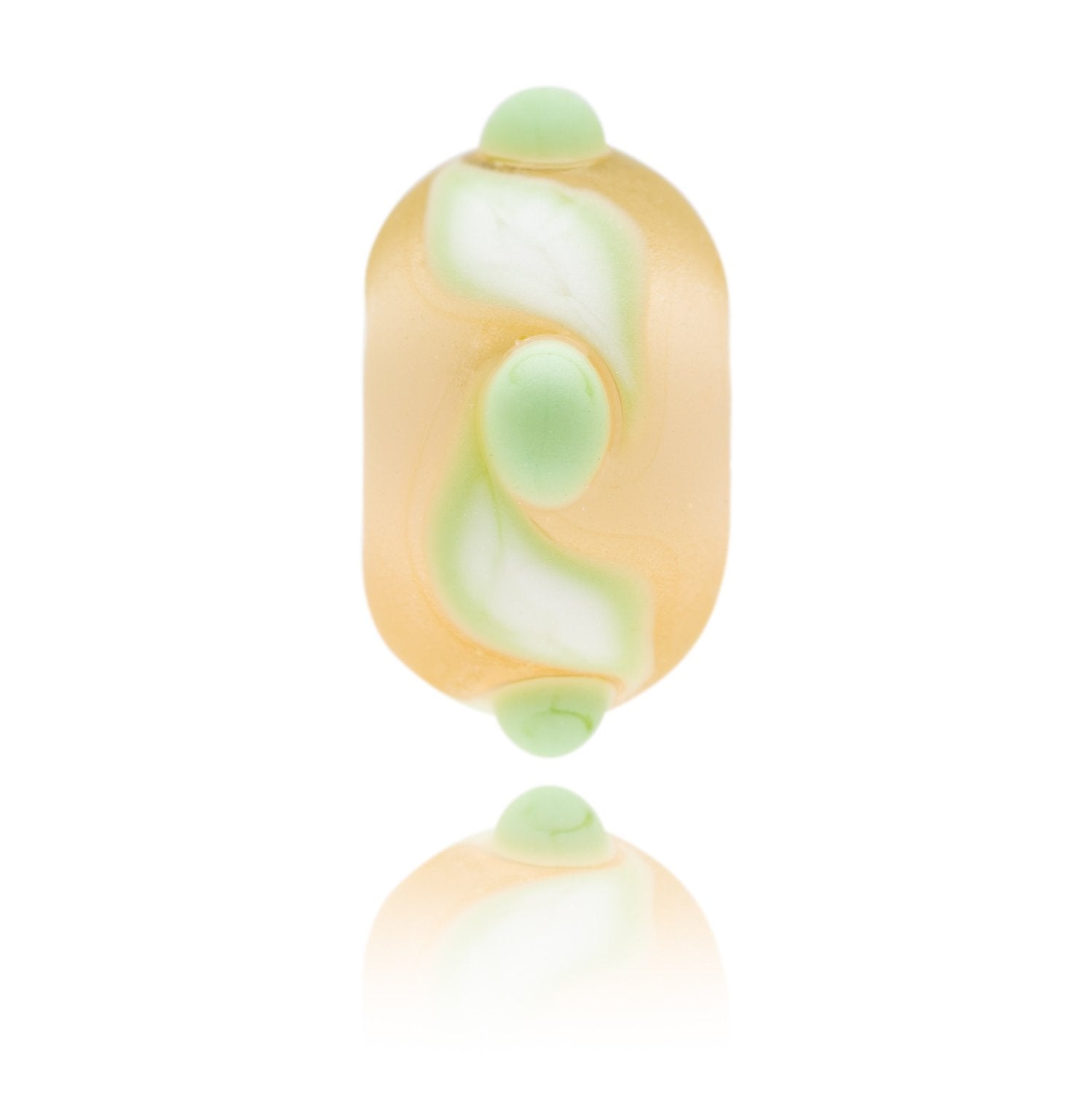 Peach frosted glass bead with green and white swirl patterns around the middle. Representing Pevensey Bay in Sussex, UK.