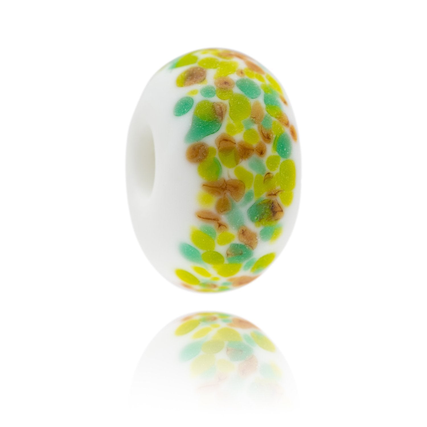 White glass bead with brown, green and yellow dots on the surface, representing Raise Helvellyn in Cumbria.