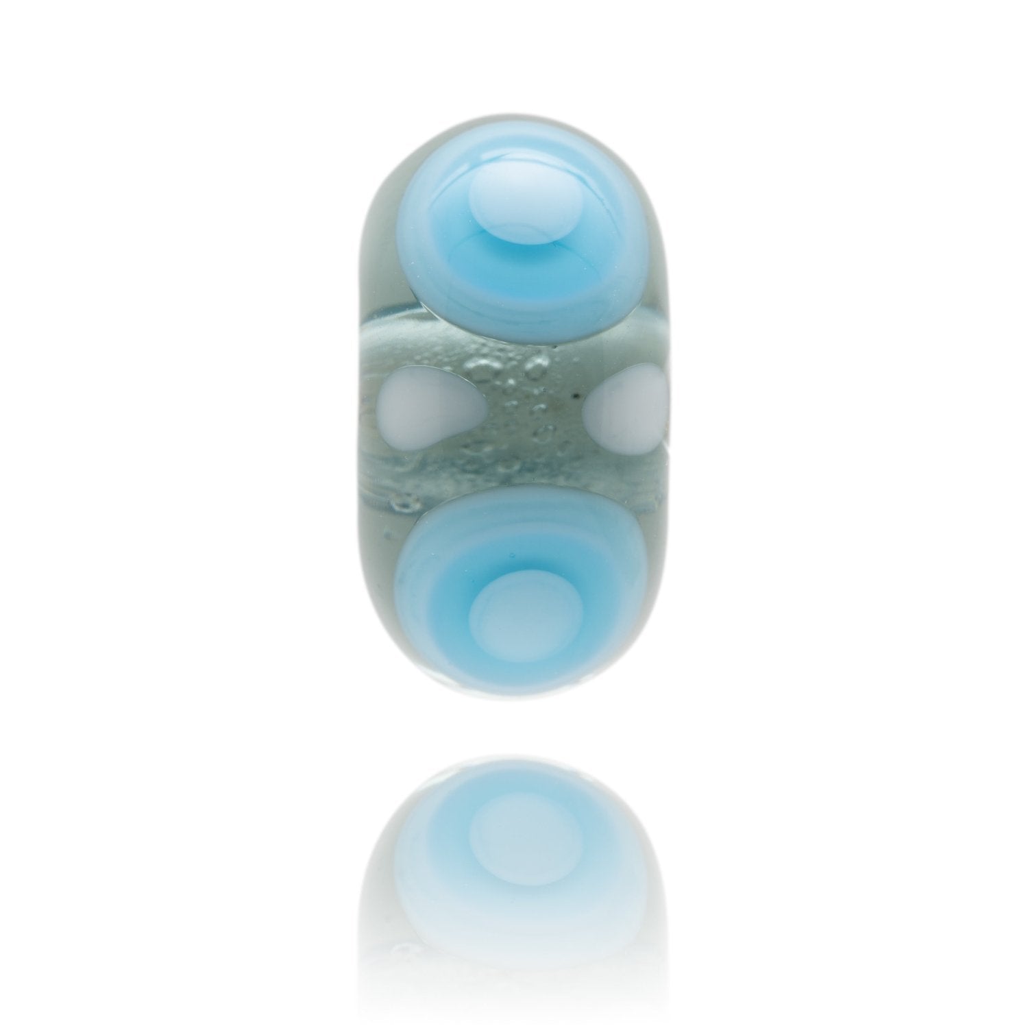 Transparent blue glass bead with circle patterns on the surface, represent Rest Bay in South Wales.