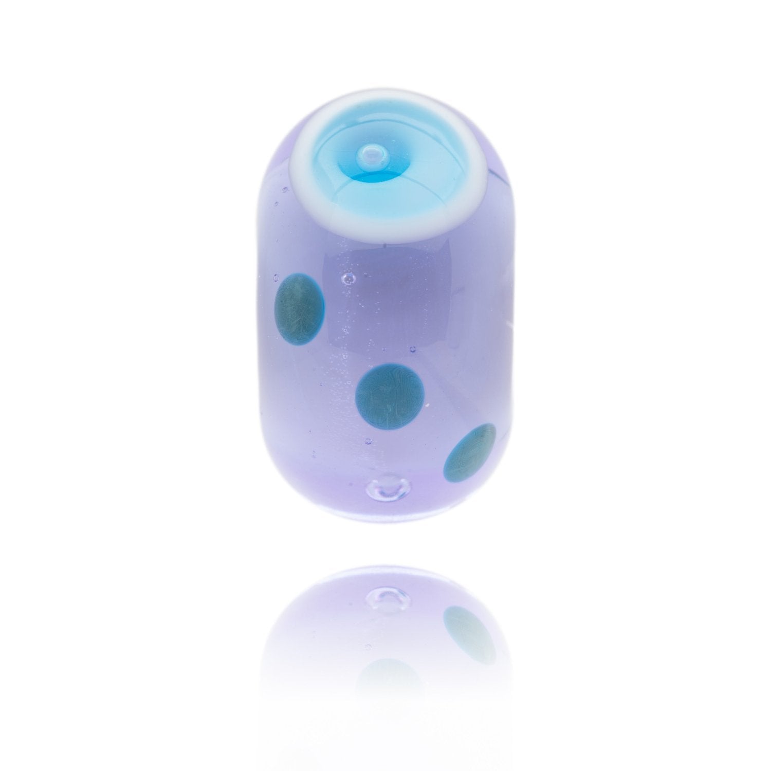 Lavender glass bead with blue bubble pattern on the surface, representing St Michaels Mount in Cornwall.