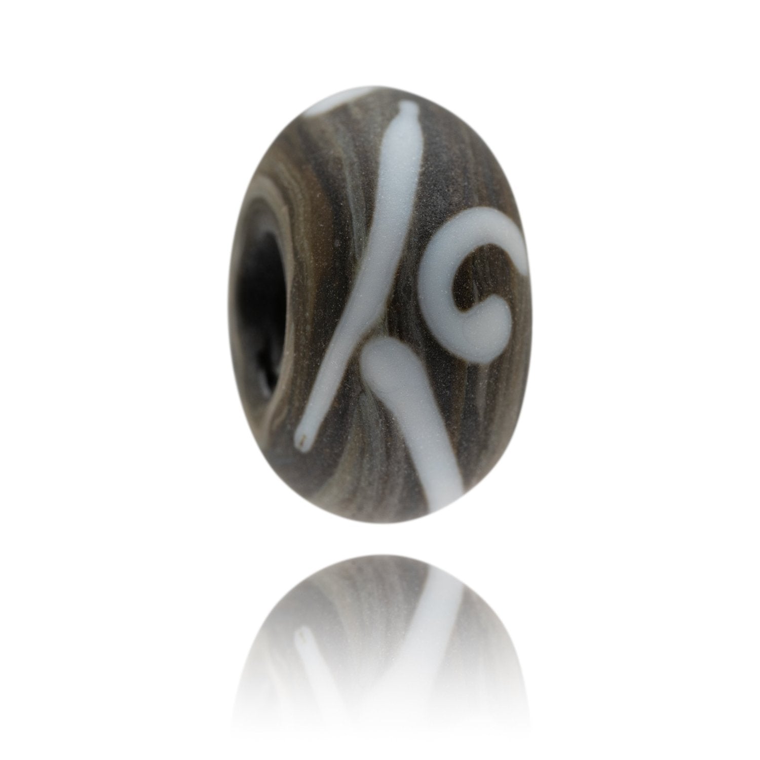 Dark green brown glass bead with white patterns on the surface. Representing Staithes in Yorkshire.