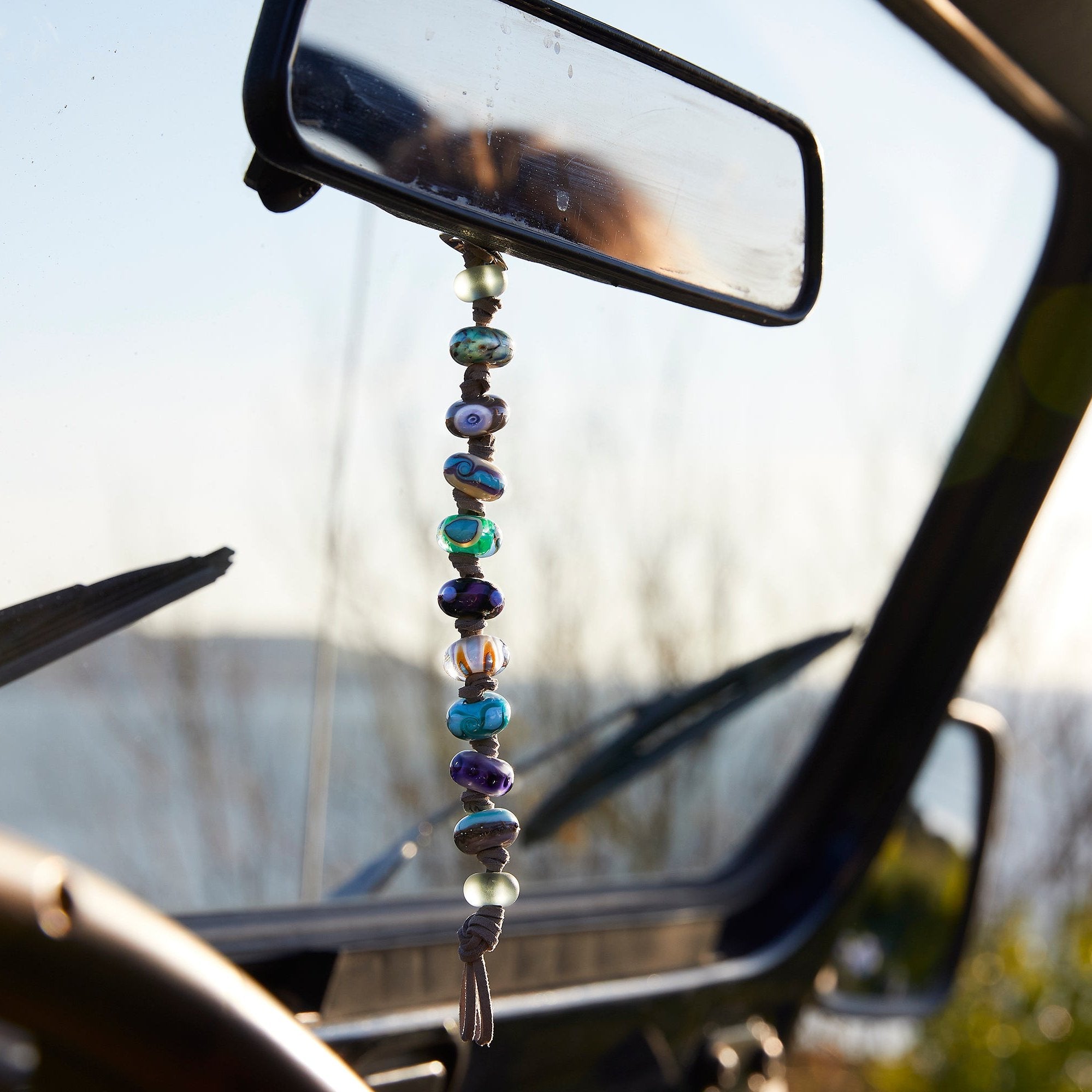 String of lamp work glass beads inspired by Devon beaches.