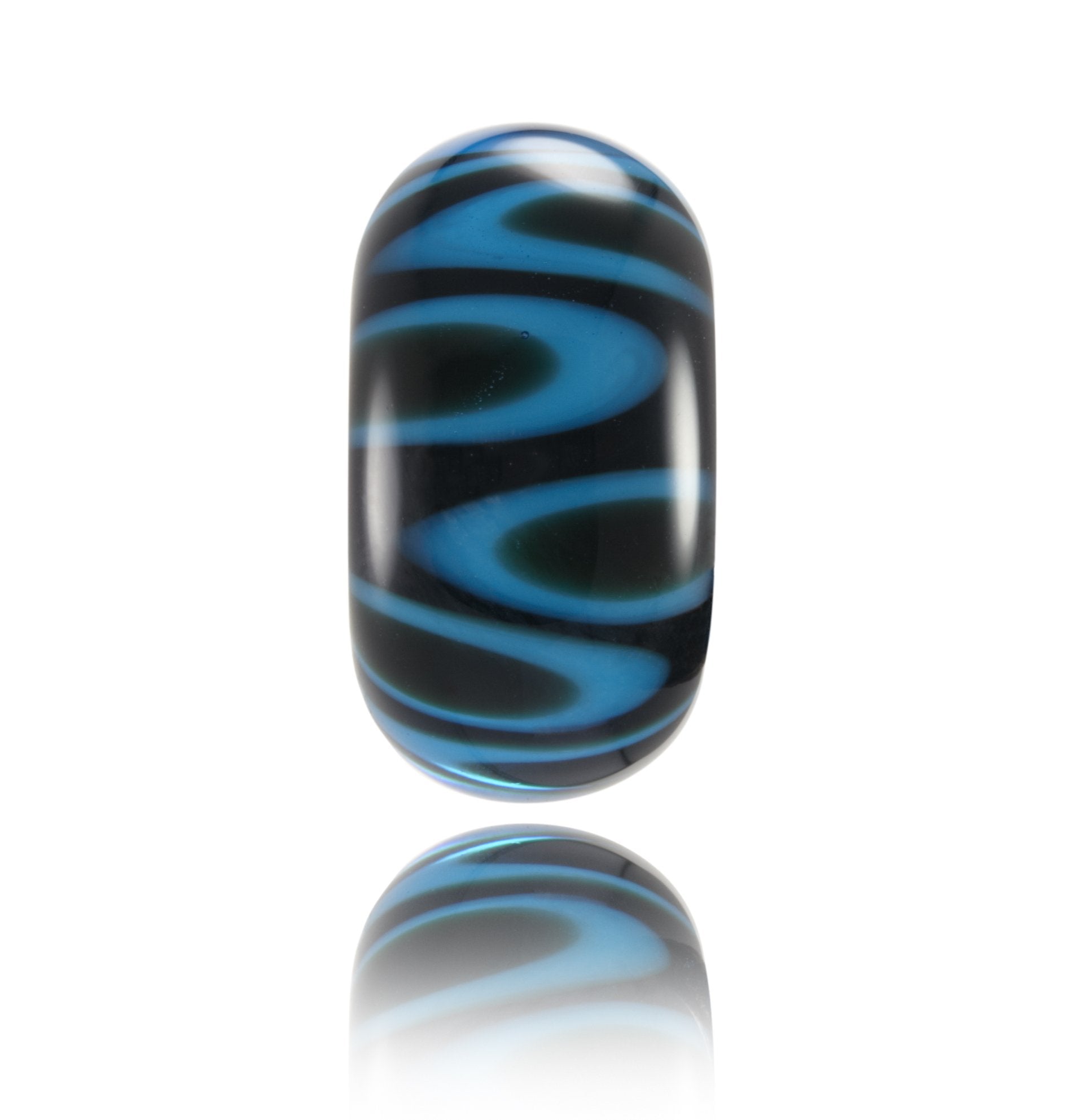 Deep dark blue glass bead with small islands beneath the surface, inspired by the island of Bali in Indonesia.