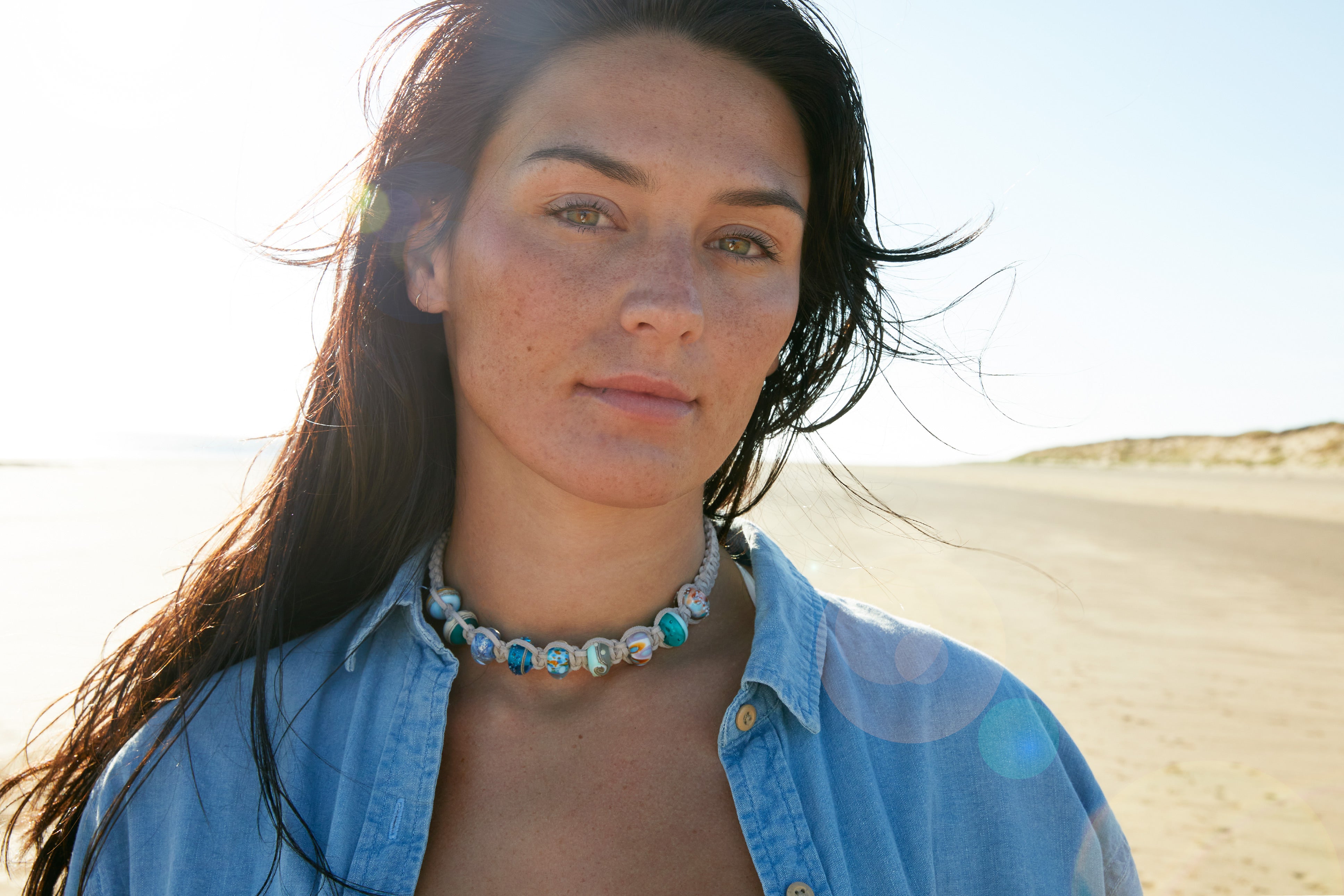 Beach surfer style macrame choker necklace made with glass beads representing Cornish beaches.