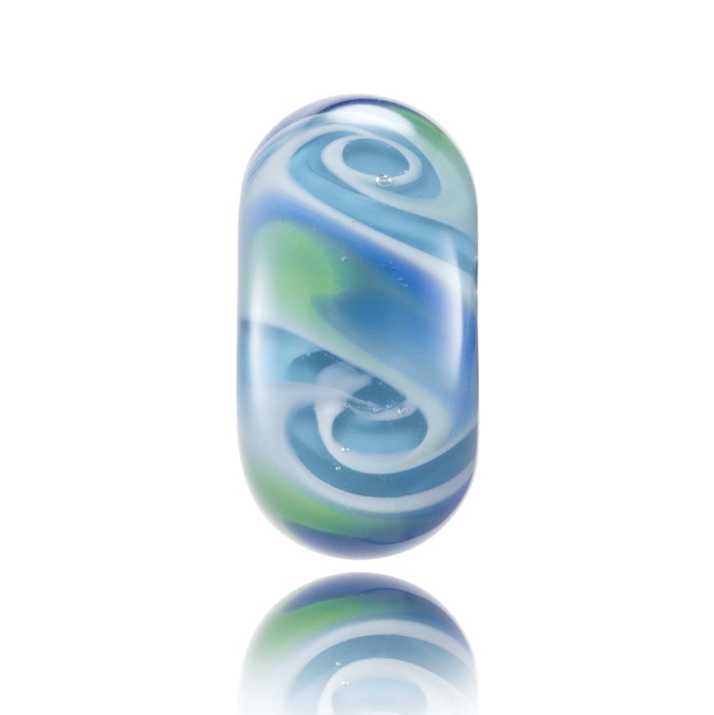 Swirling blue, clear and green glass charm bead for the Indian Ocean.