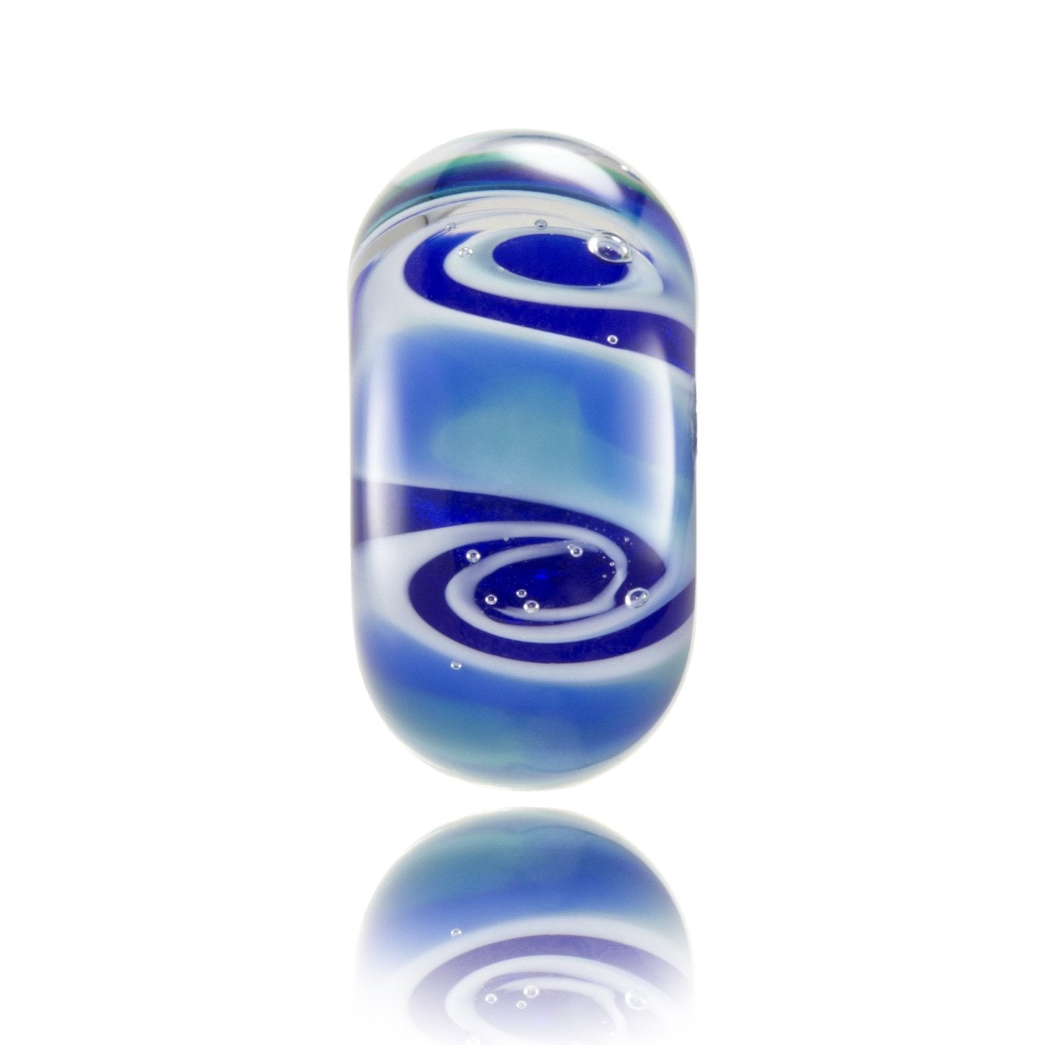 Blue, white and green swirling glass bead representing the Pacific Ocean.