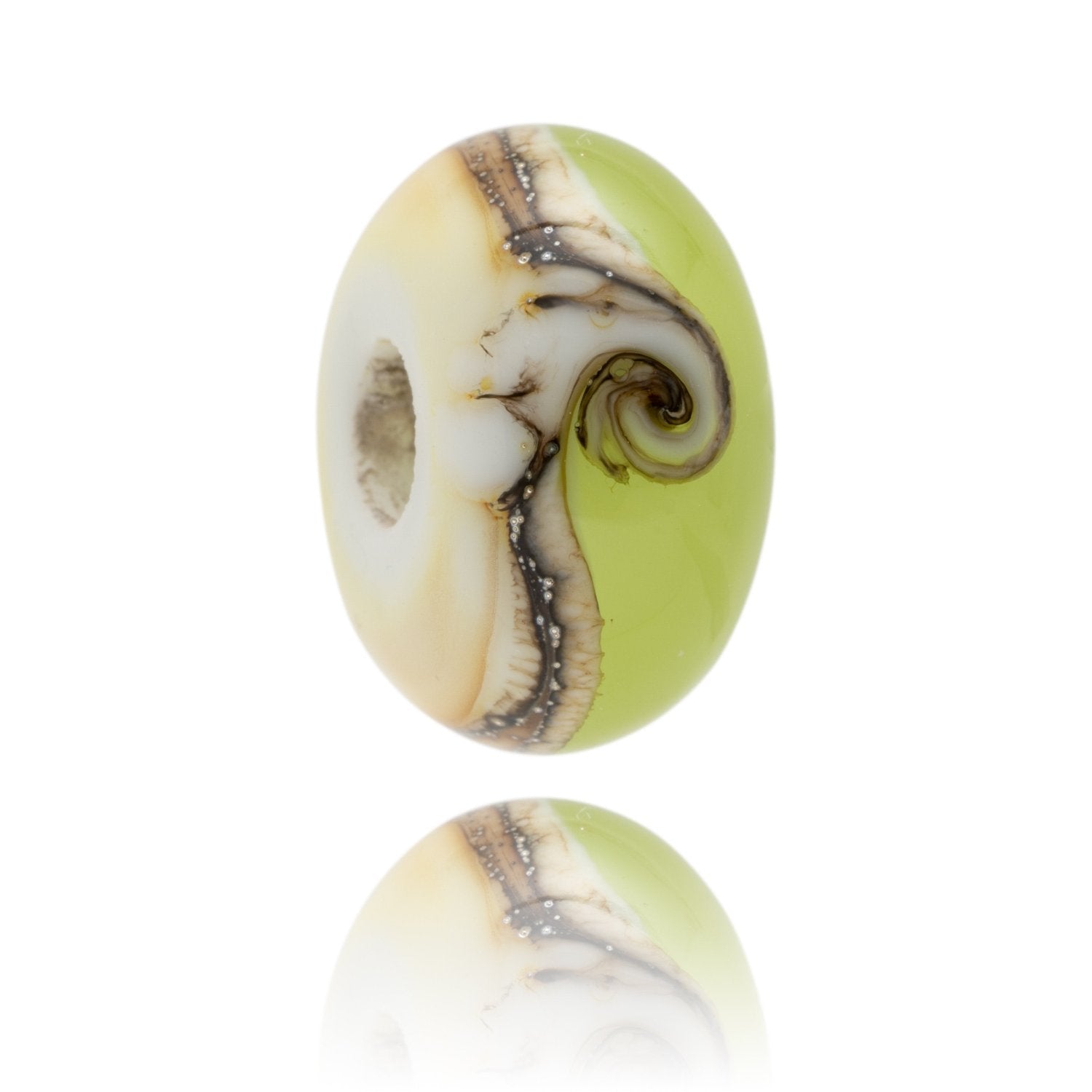 Green and cream swirling glass bead with a silver wave pattern, representing a Point Break surf wave.