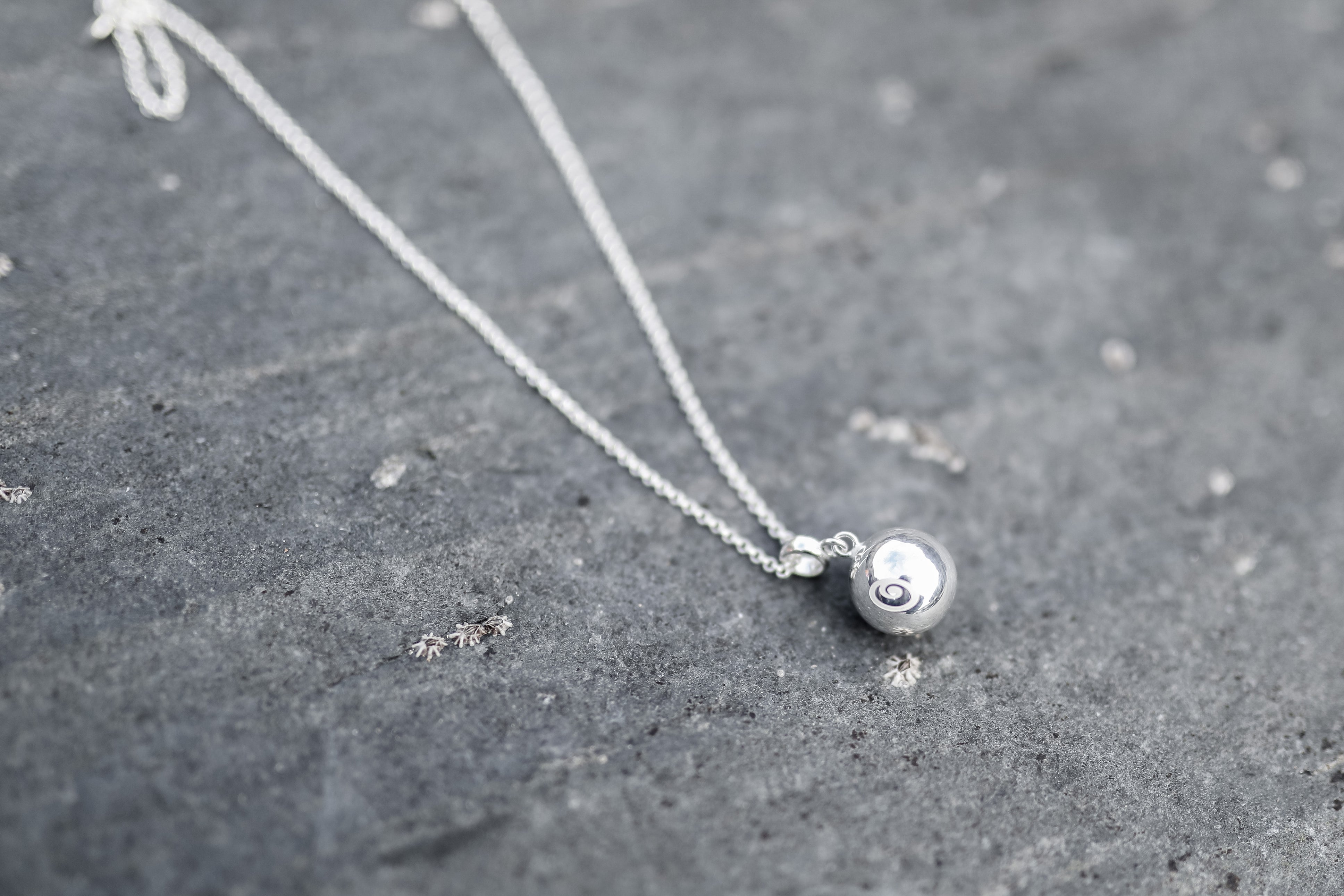 Nalu Silver Chime Ball Necklace Lifestyle Image